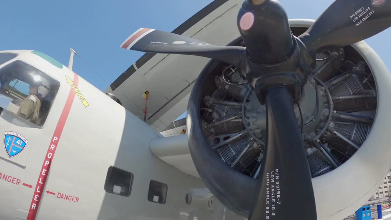 Wide angle closeup of military plane engine displayed on flight deck of the USS Midway Museum