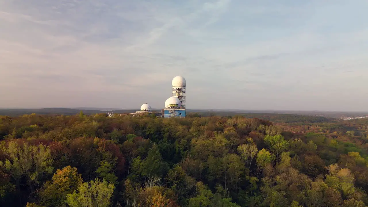 Calm aerial view flight pull in drone at autumn forest Radom at morning sunrise devil's mountain in woods berlin October 2022