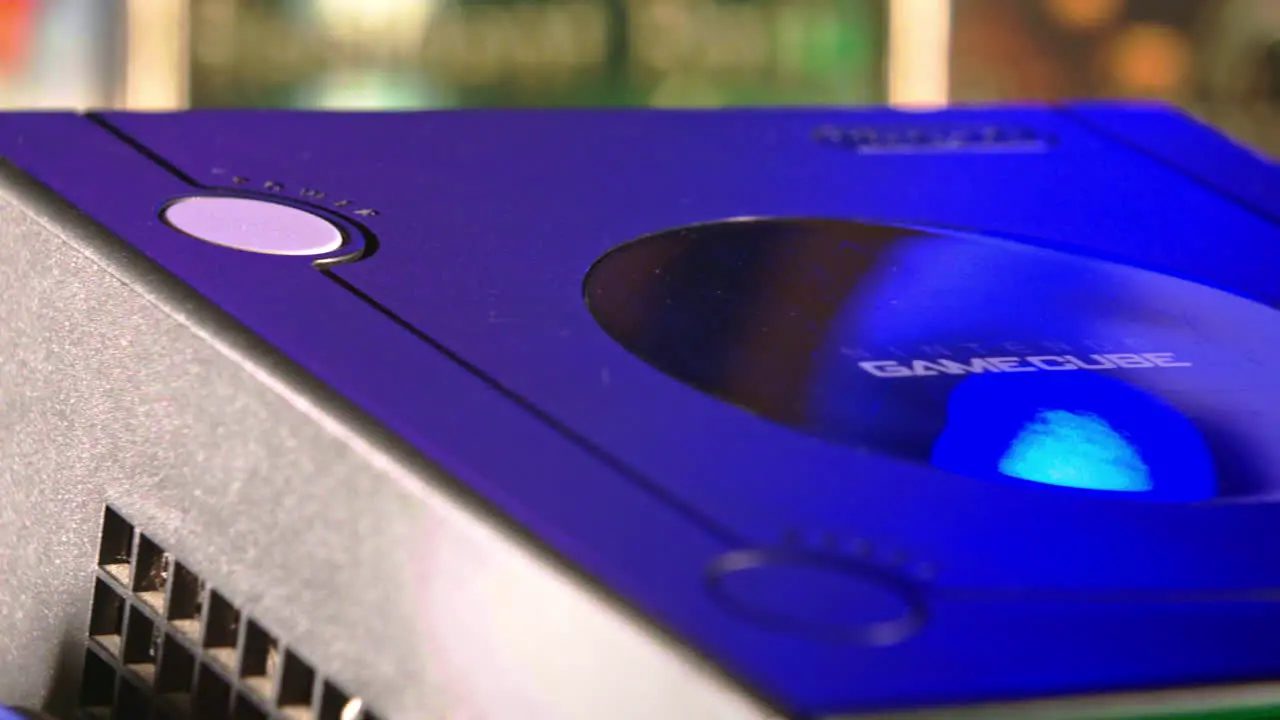 Opening Top of Nintendo Gamecube with Disc Inside and Color Effect SLIDE RIGHT