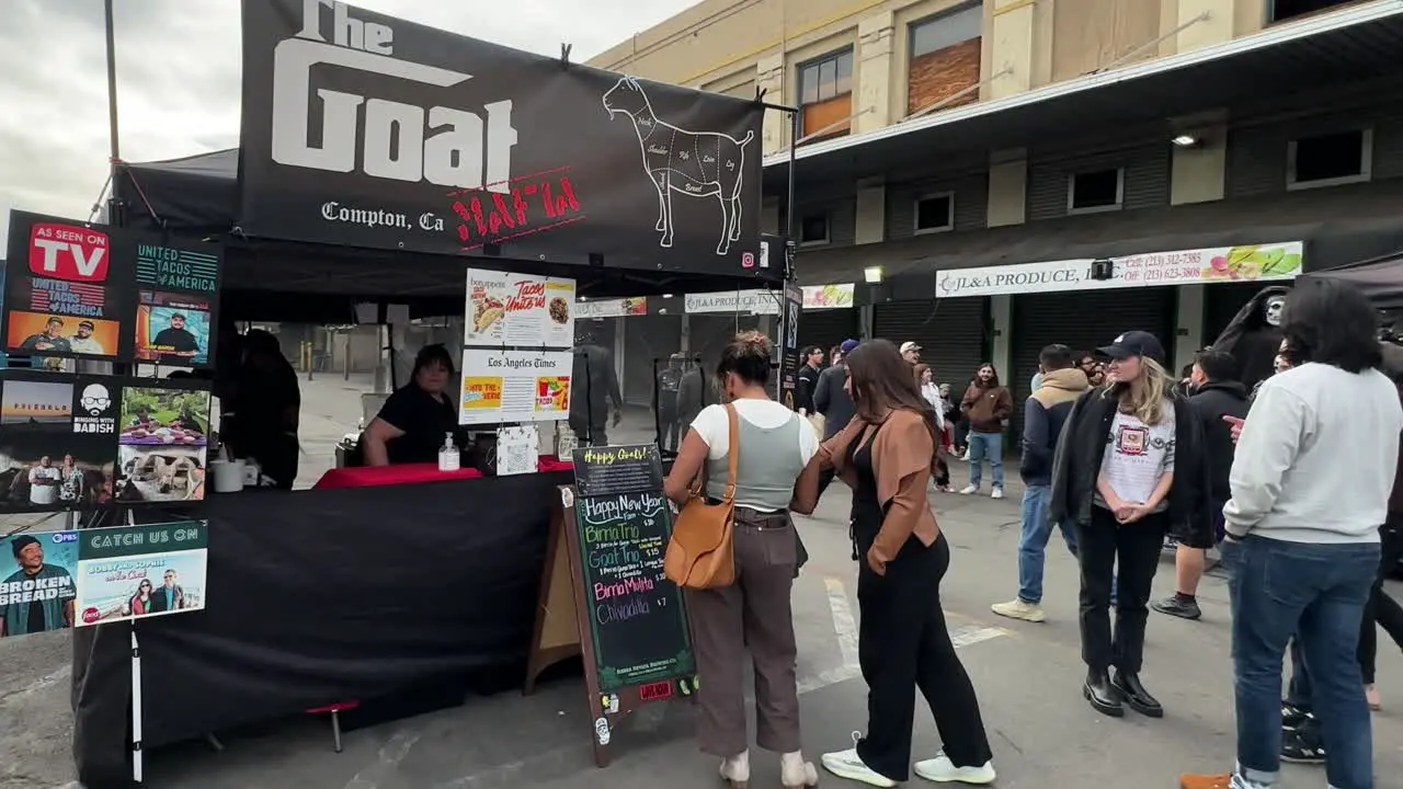 Patrons ordering food at Somrgasburg the largest open air food market in Los Angeles