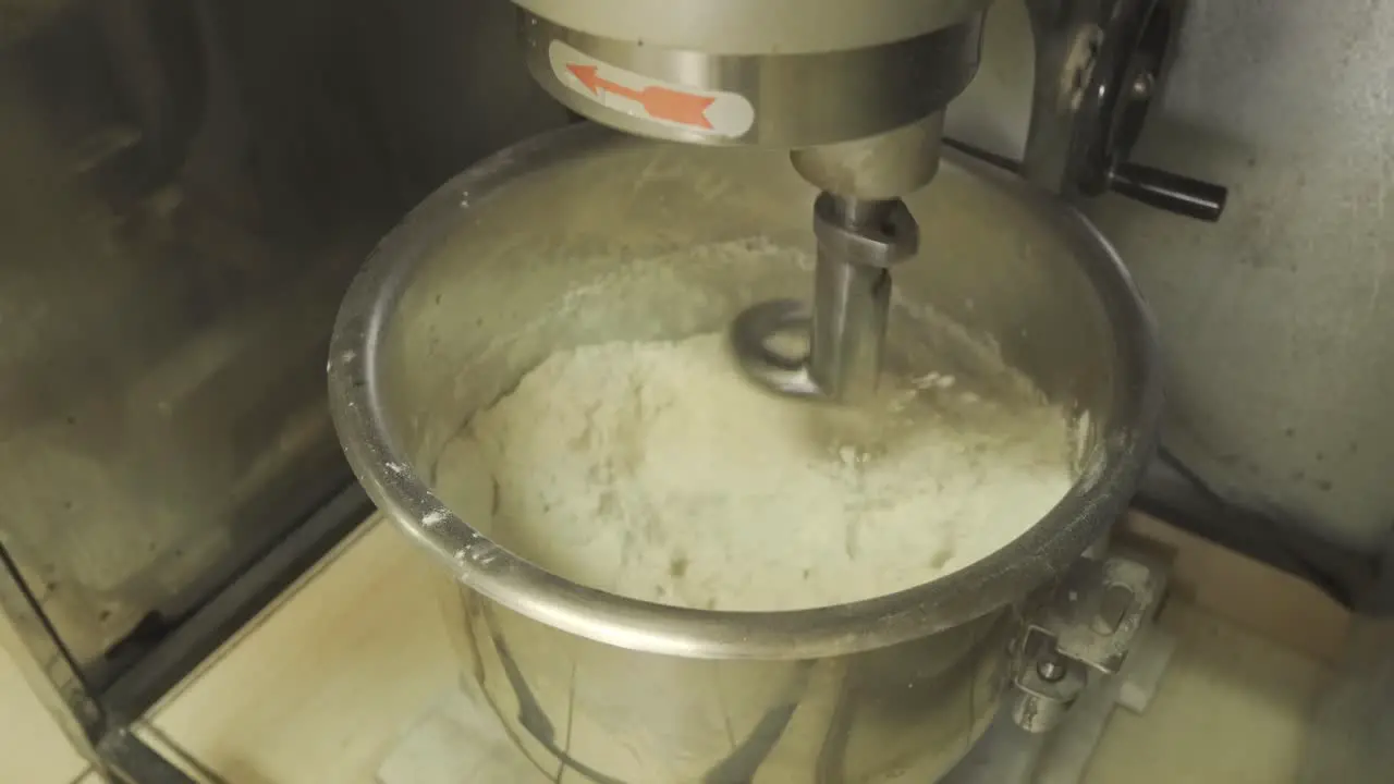 Mid Shot of Pizza Dough in Mixer