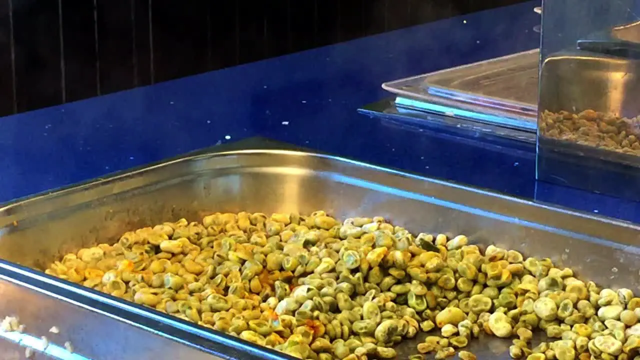 Hot beans in a tray of a buffet