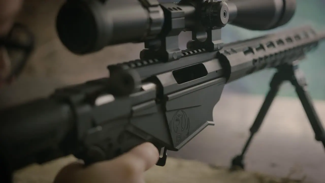 Shooter aiming Ruger precision rifle and takes finger from trigger without shot