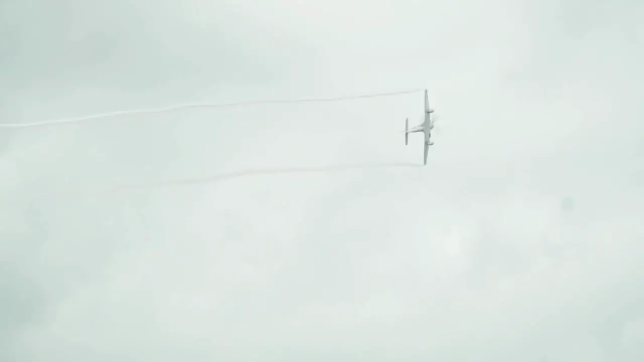 Military aircraft performing wingtip vortices at an airshow