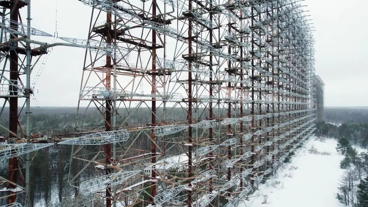 Enormous Duga radar antenna grid in Chernobyl taiga in winter snow