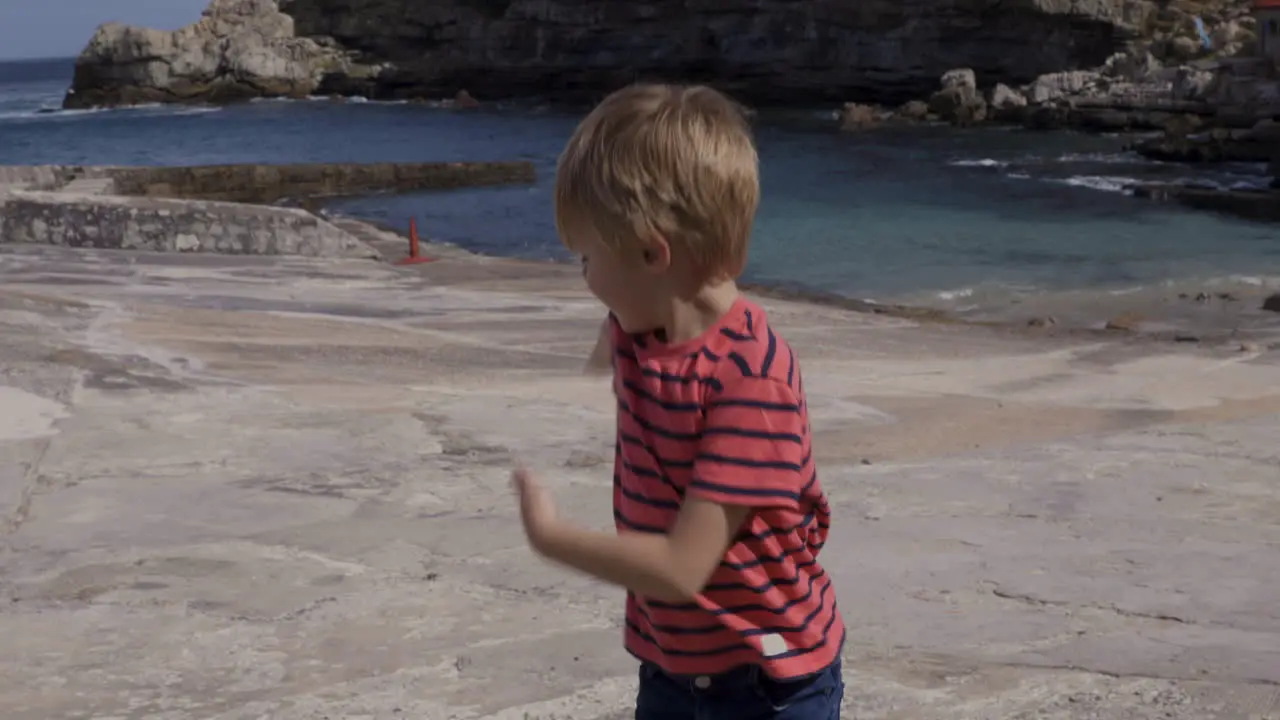 Cute boy doing quirky dances for the camera