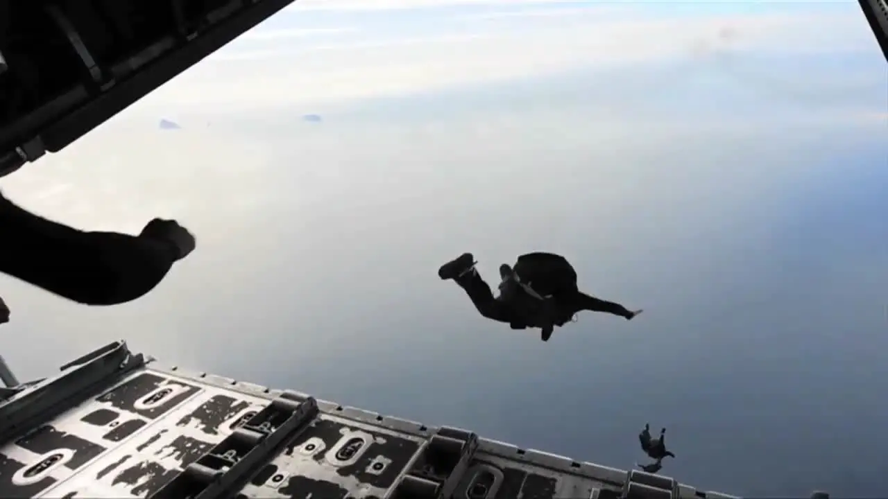 Paratroopers Jump From An Airplane