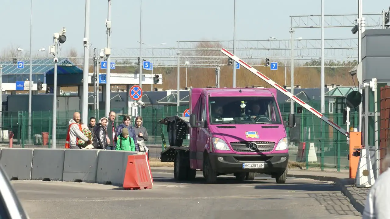 Ukrainian refugees crossing customs border between Ukraine and Poland in Dorohusk Poland