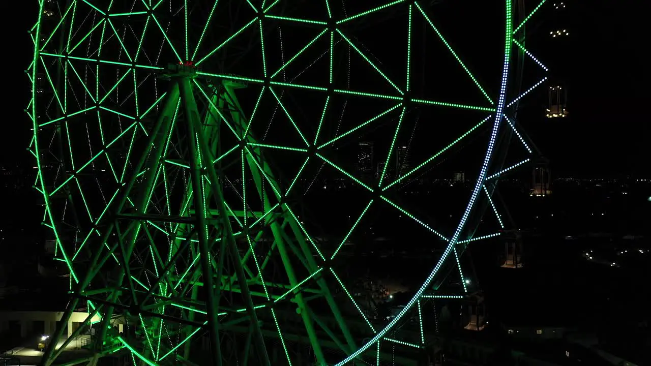 Drone close-up Colorful ascent of the newest Ferris wheel at Aztlan Parque Urbano Chapultepec