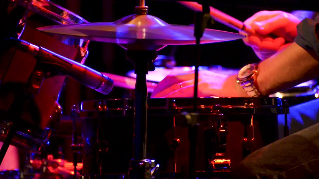 Jazz drummer at a concert theater scene drums video moving camera closeup