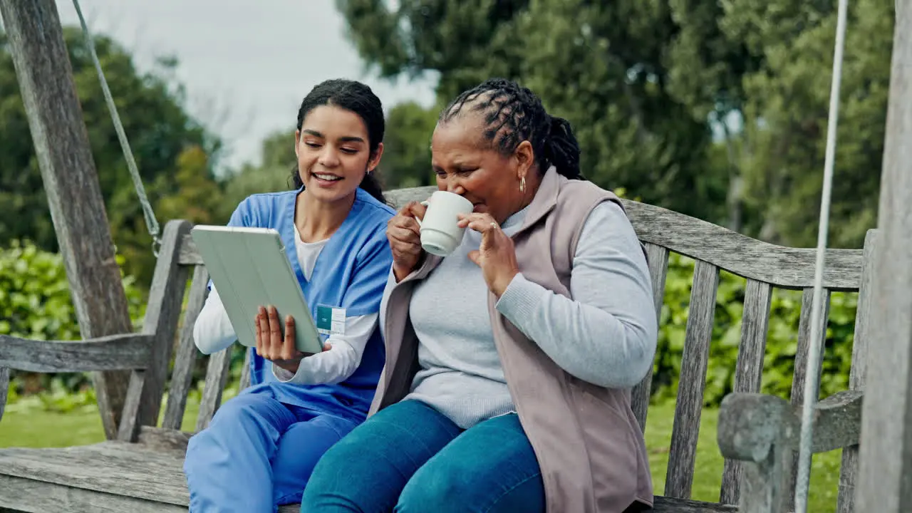 Happy woman nurse and patient in relax on tablet