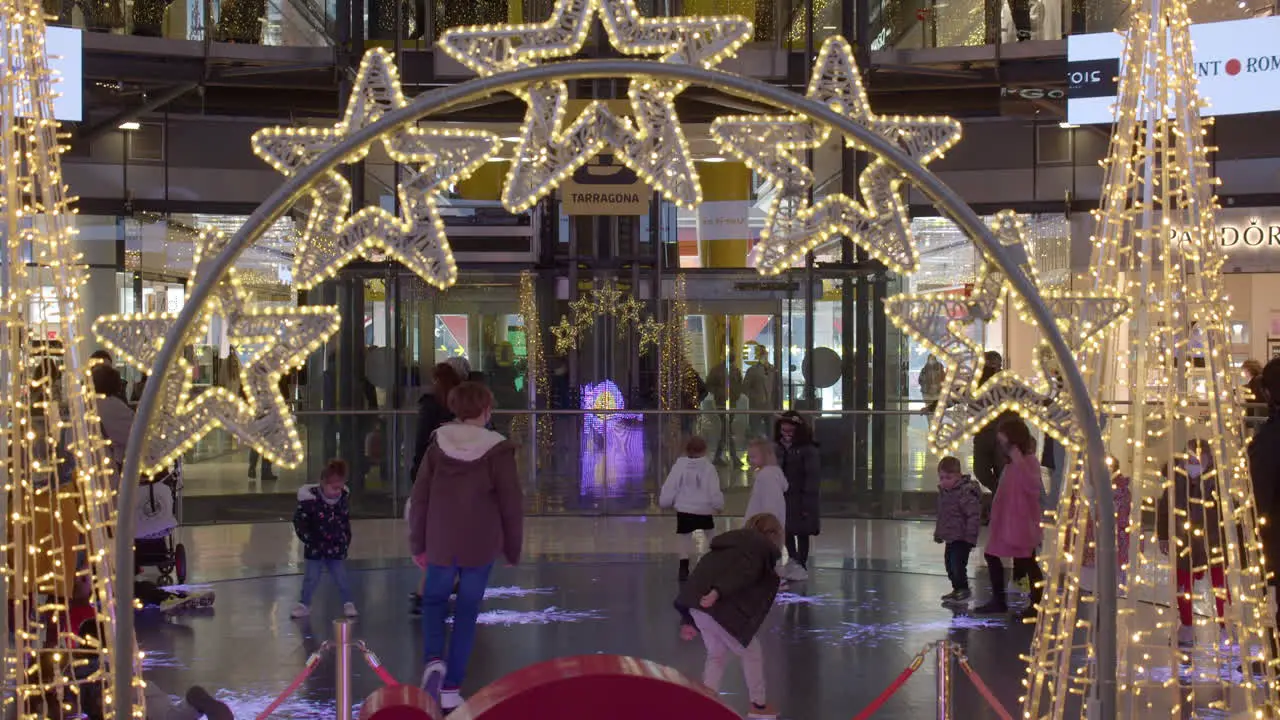 Children making freezing effects with steps on interactive floor display