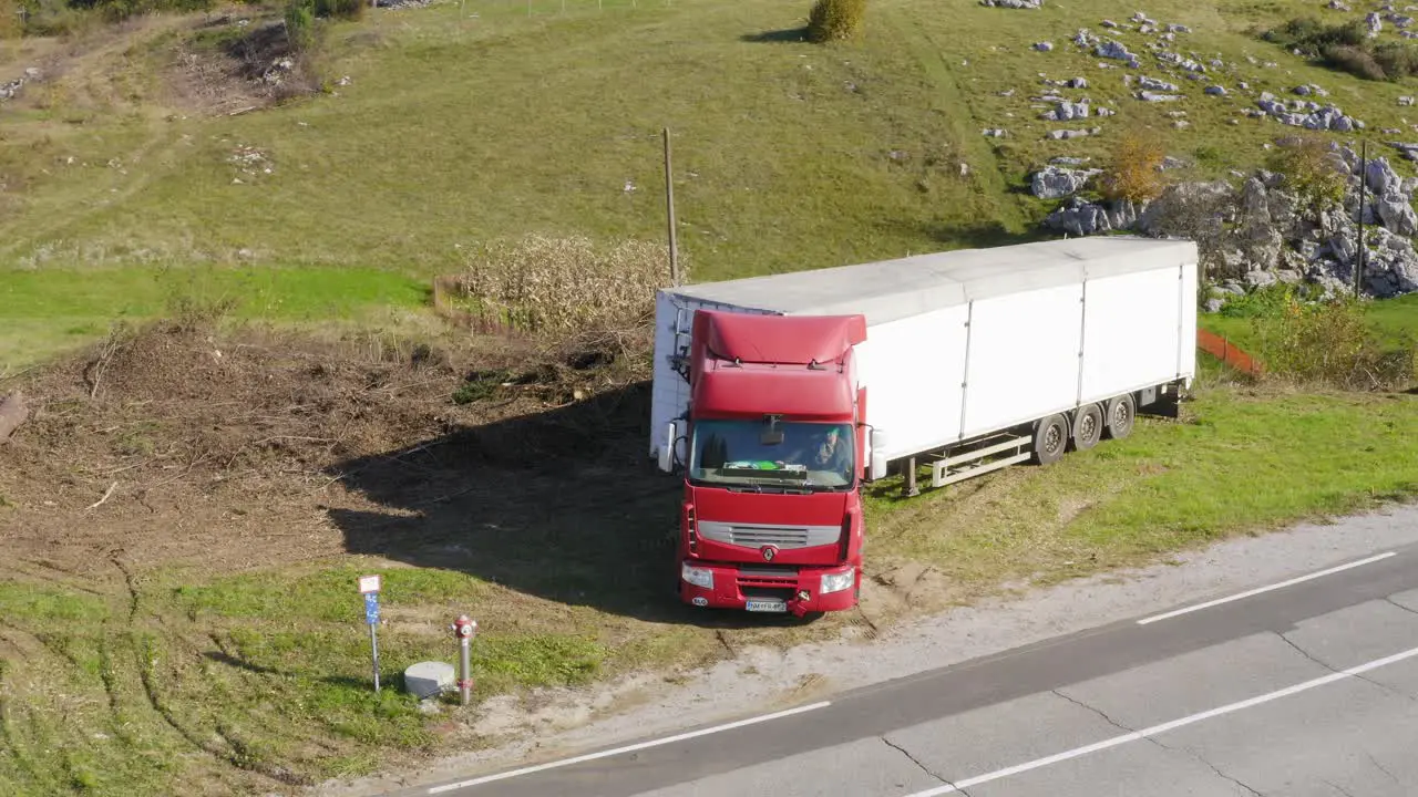 Aerial View Of Large Lorry With Container Parked By The Roadside