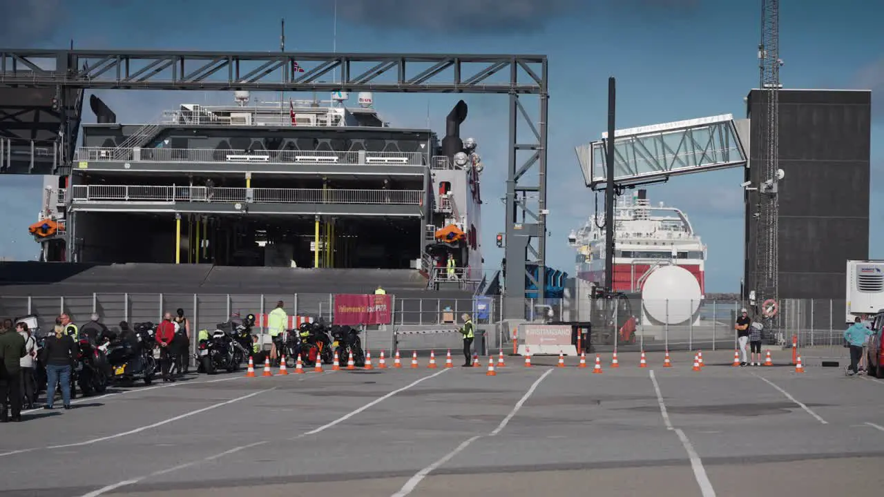 A line of bikers waiting to board a ferry