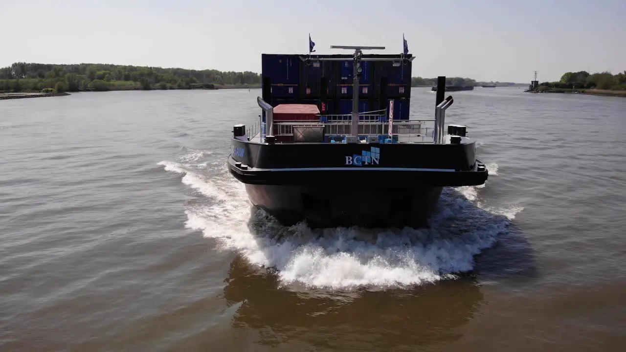 Cargo Vessel Of Den Bosch Max Blauw Travelling On The River At Daytime