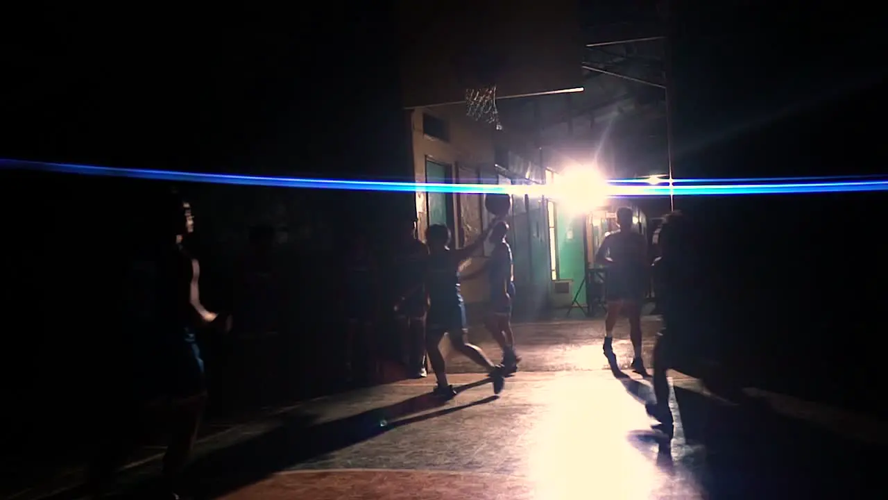 cinematic shot basketball players practicing in a basketball court