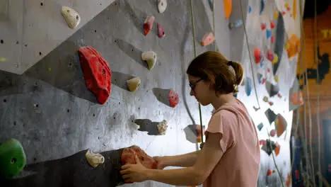 Boy indoor climbing