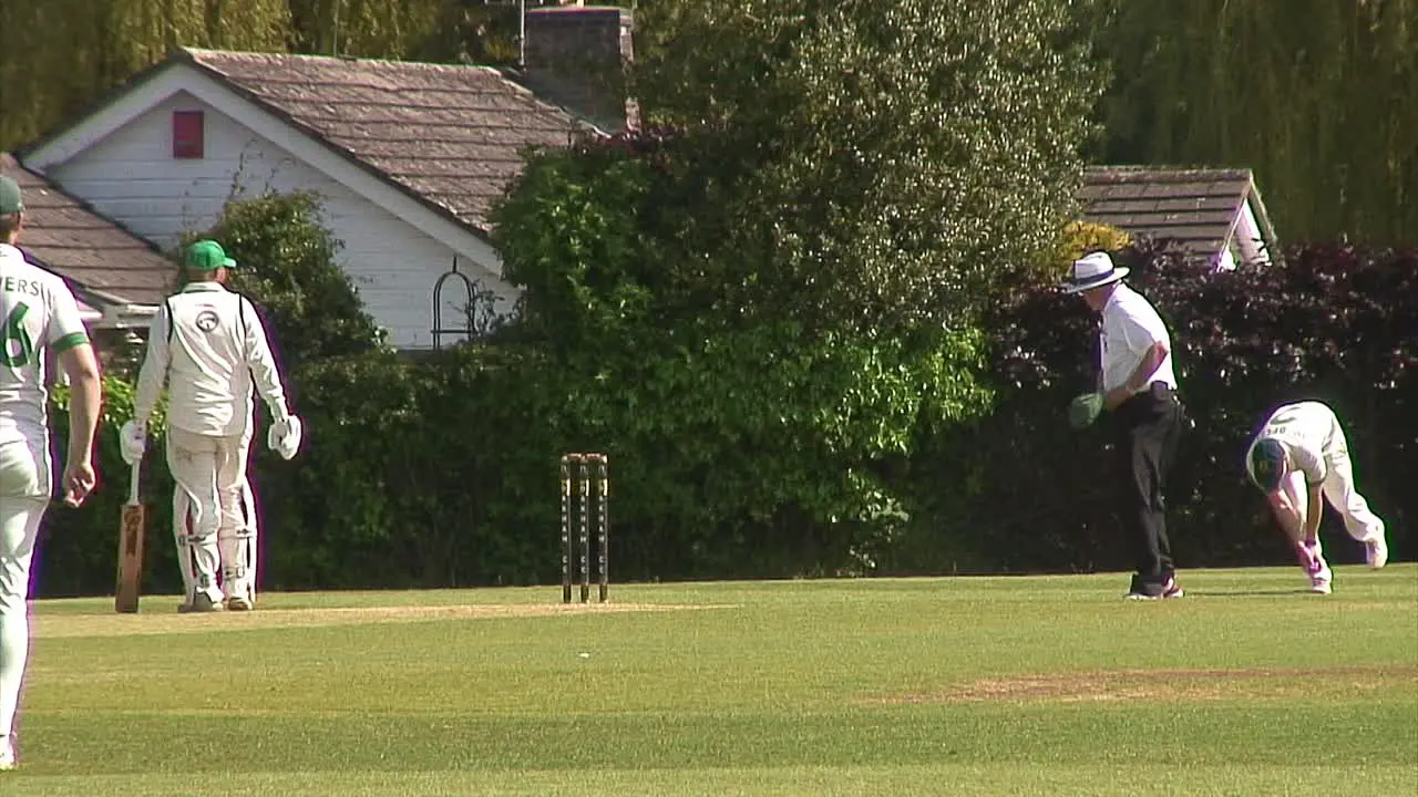 Two English teams competing against one another in a game of cricket in the United Kingdom