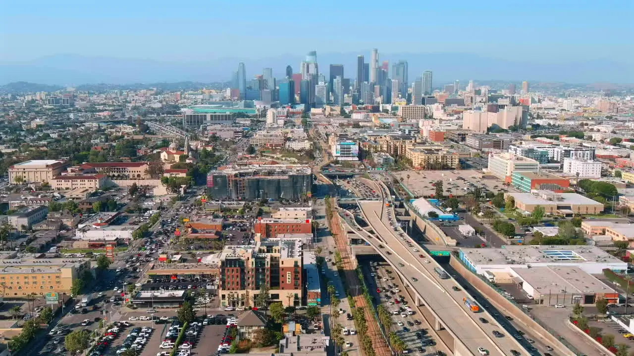 Downtown Los Angeles with residential buildings and business skyscrapers establishing cityscape sunny day