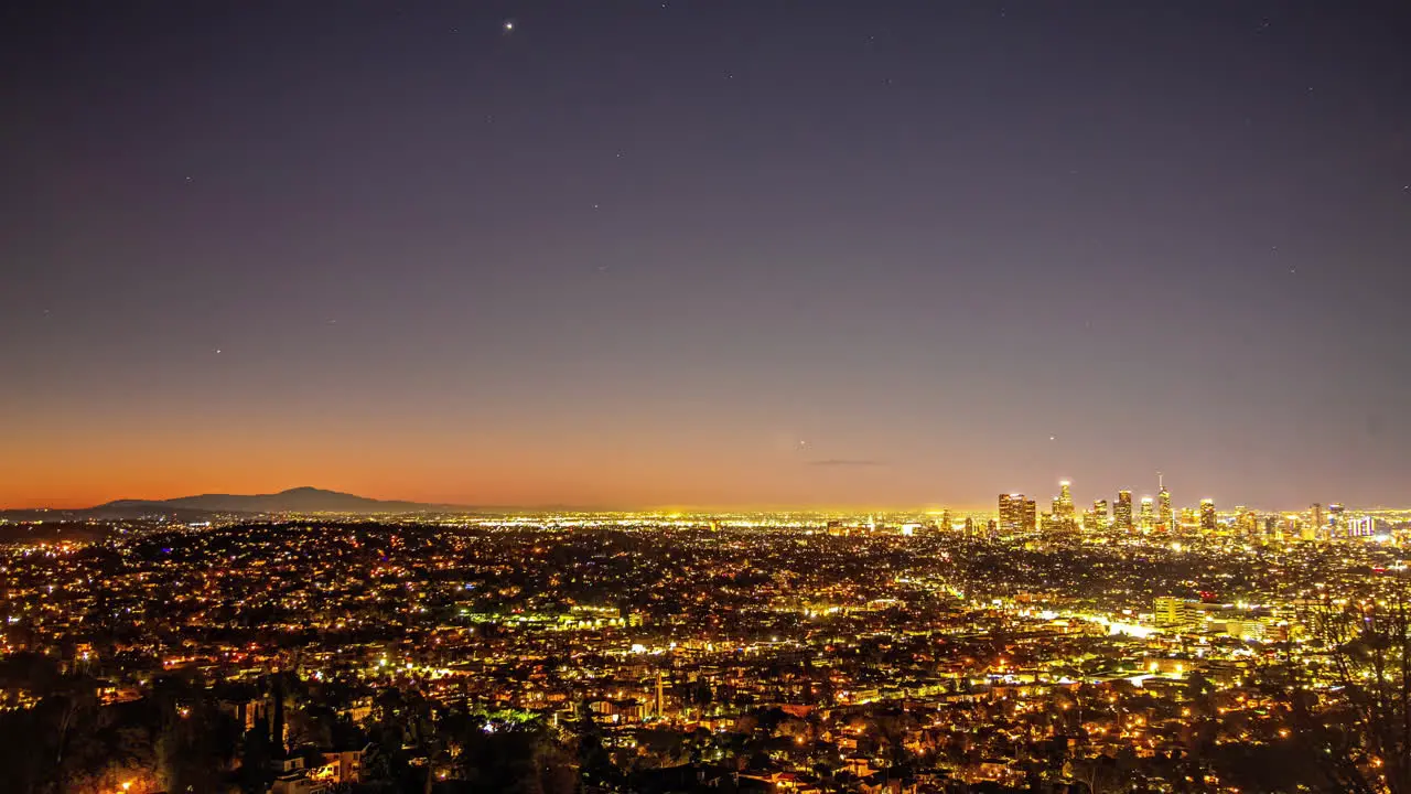 Night to day sunrise Los Angeles city beautiful transition over in America