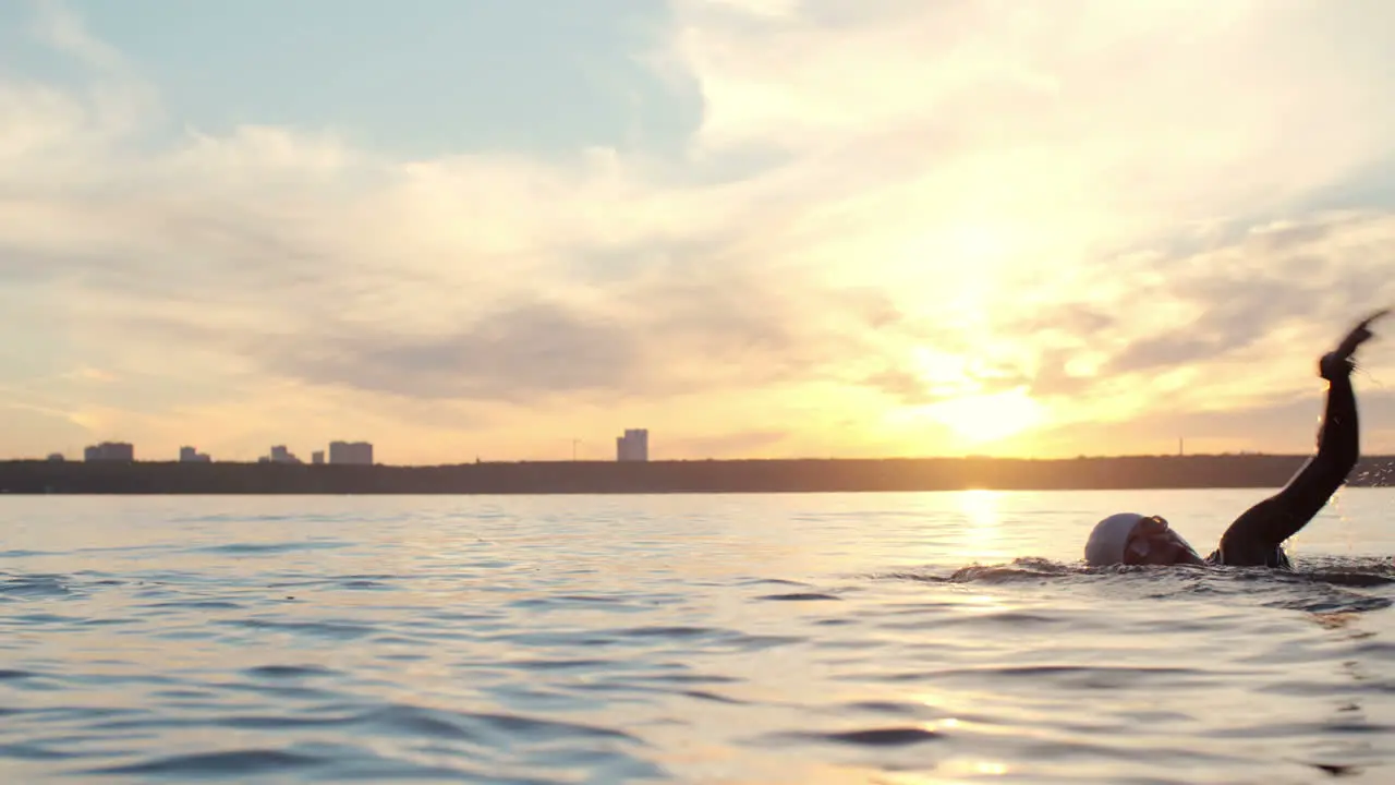 Woman Dressed In Wetsuit And Swimming Cap 1