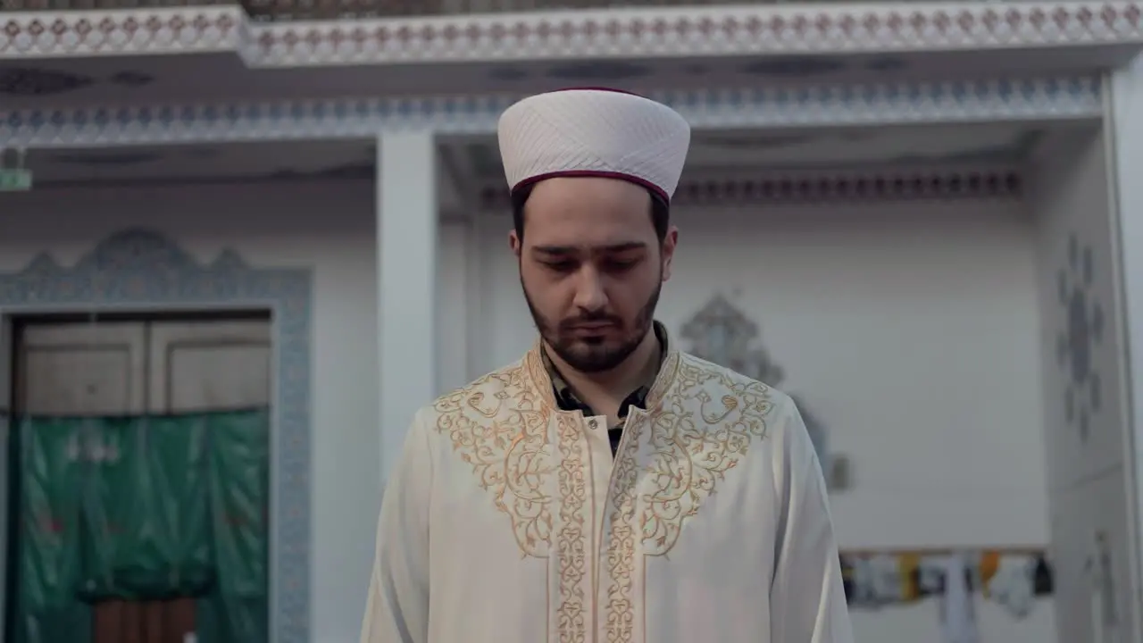 Young Imam Worships In Mosque