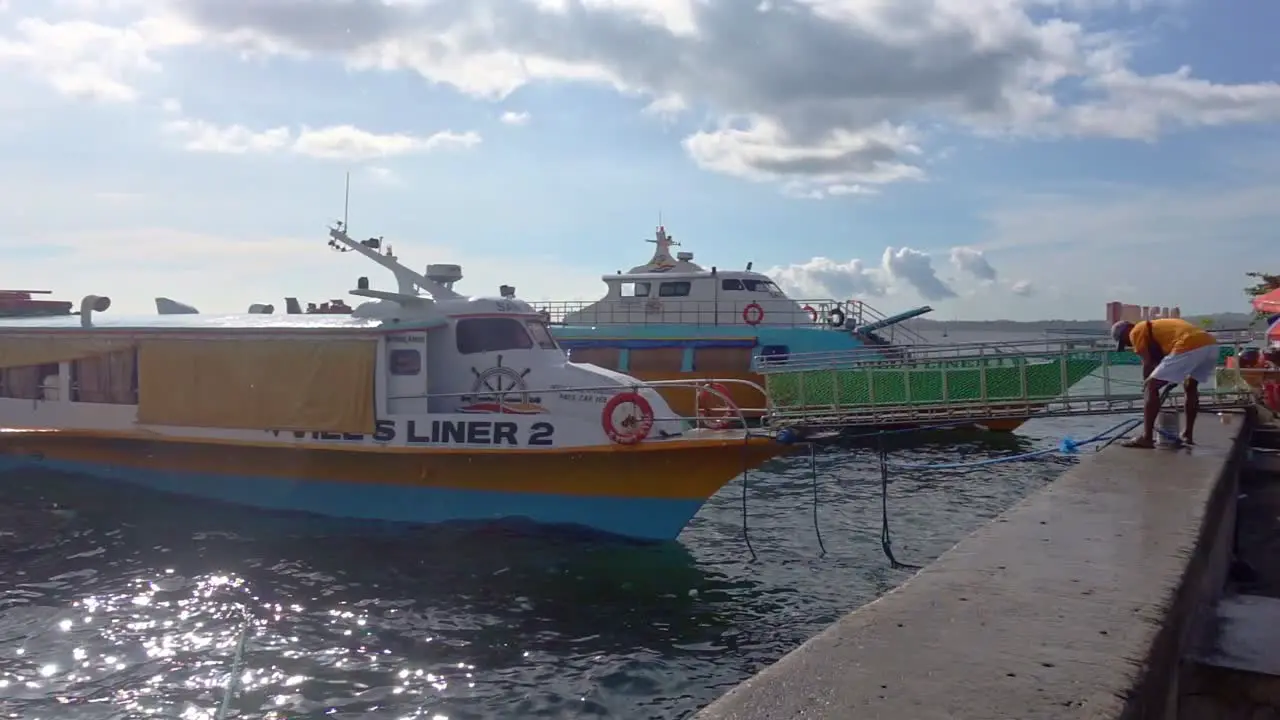 Surigao City Boulevard Philippines Small Passenger Boats prepare to take commuters and island hopping tourists on their journey