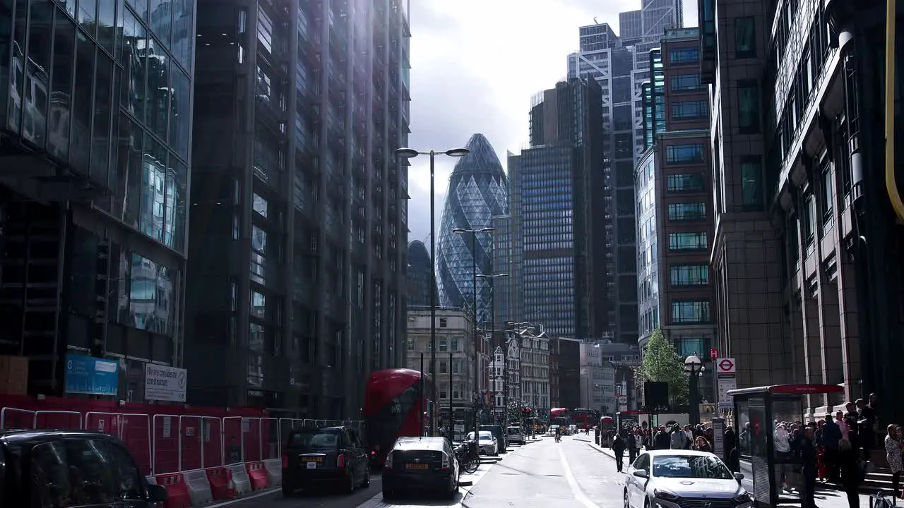 London England -September 29 2021 Buses and cyclists travelling along Liverpool Street in the financial district of the City of London near Liverpool street train station