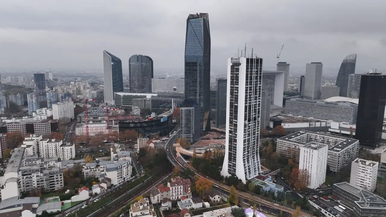 Aerial view of La Défense on a cloudy afternoon showcases its modernity