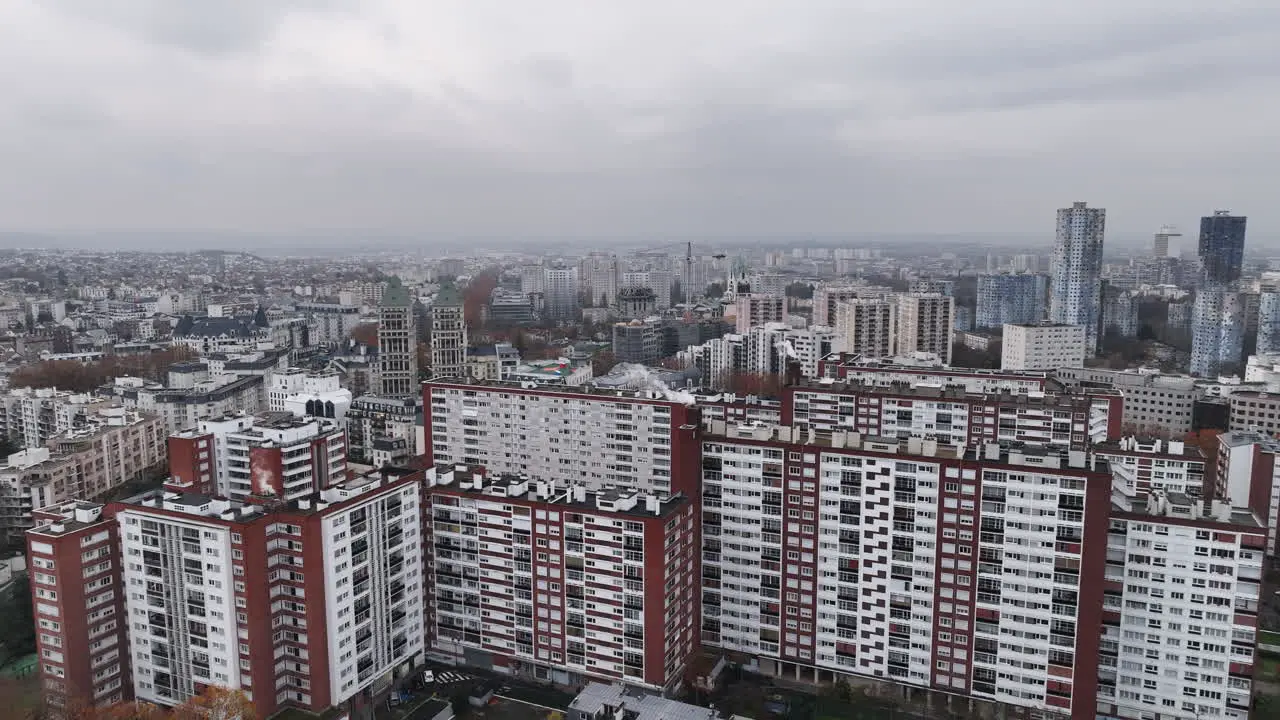 Paris's urban landscape in La Défense emerges amid cloudy conditions