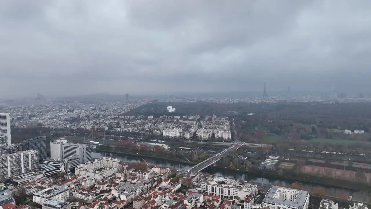 La Défense Paris's business heart shrouded in a cloudy embrace