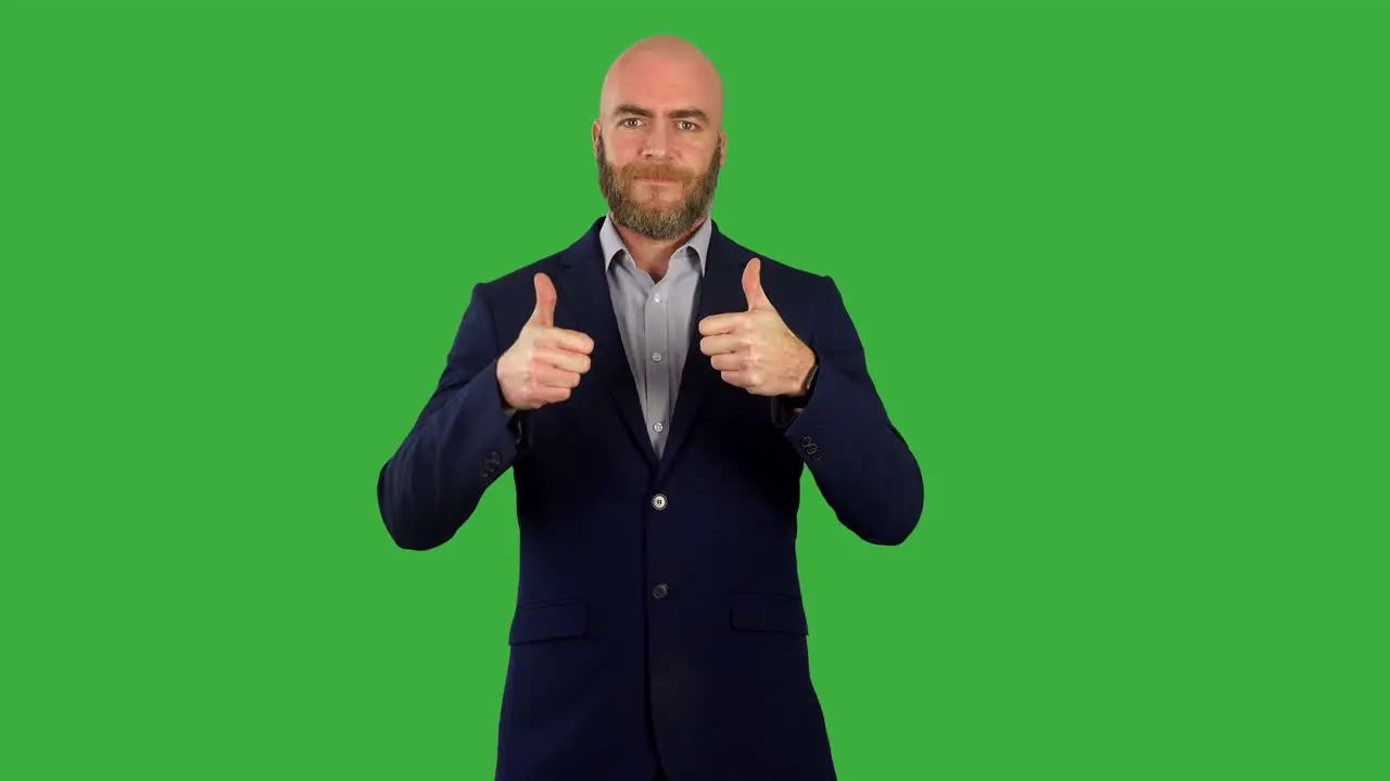 Thumbs up gesture from a businessman on green screen