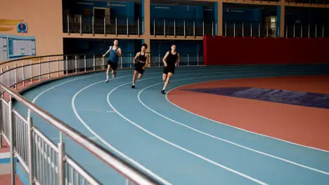 Three athletes on a race