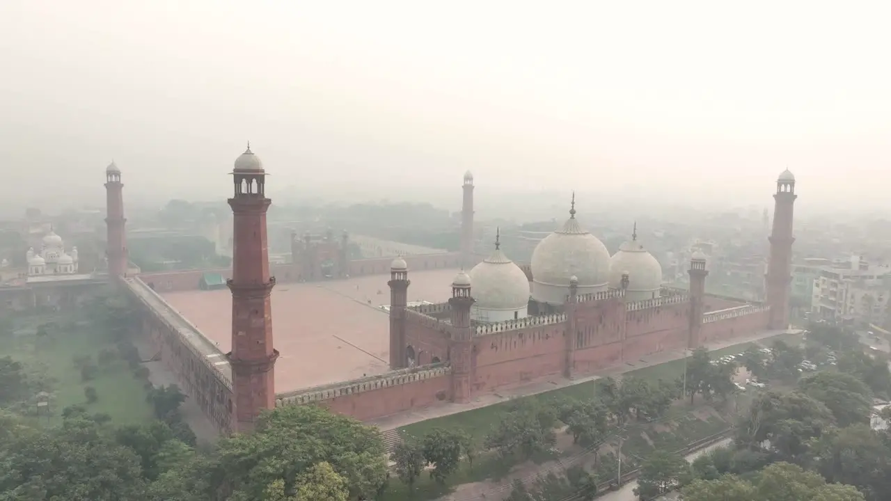 Aerial View Of Iconic Badshahi Mosque In Lahore Pakistan With Hazy Air