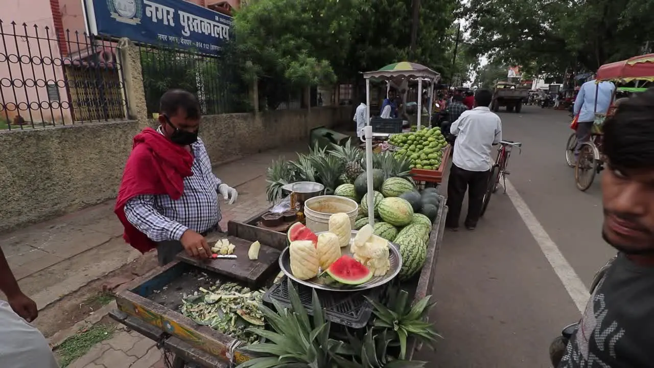 Fruit seller wears mask during covid-19 in Deoghar