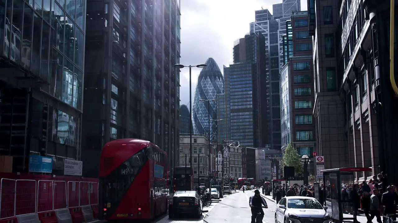 London England -September 29 2021 Buses and cyclists travelling along Liverpool Street in the heart of the financial district in the City of London near Liverpool street train station