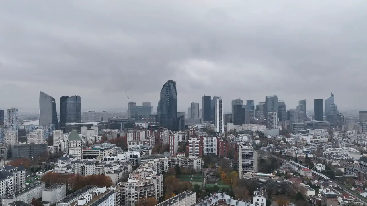 Aerial perspective captures the energy of La Défense under clouds