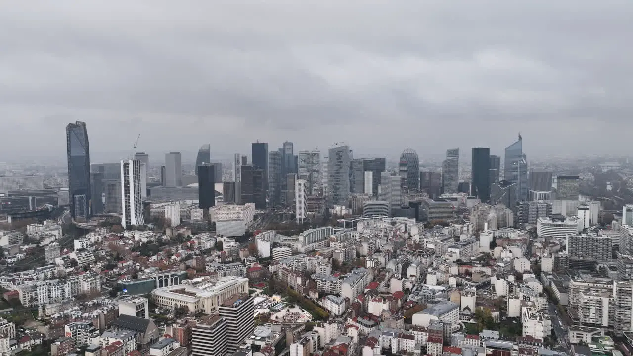 A cloudy aerial vista reveals the architectural beauty of La Défense