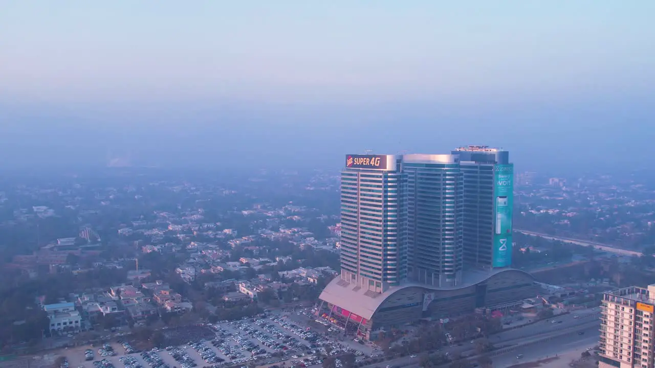 Heavy smog in Pakistan Aerial view of Centaurus Mall at dusk Islamabad