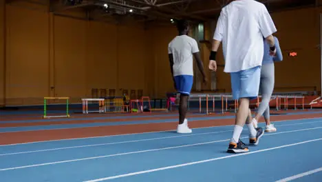 Young people walking indoors