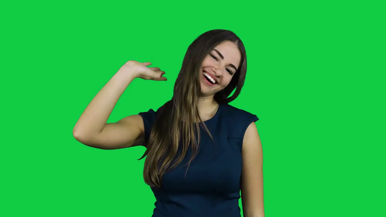 Frustrated annoyed girl in front of a green screen