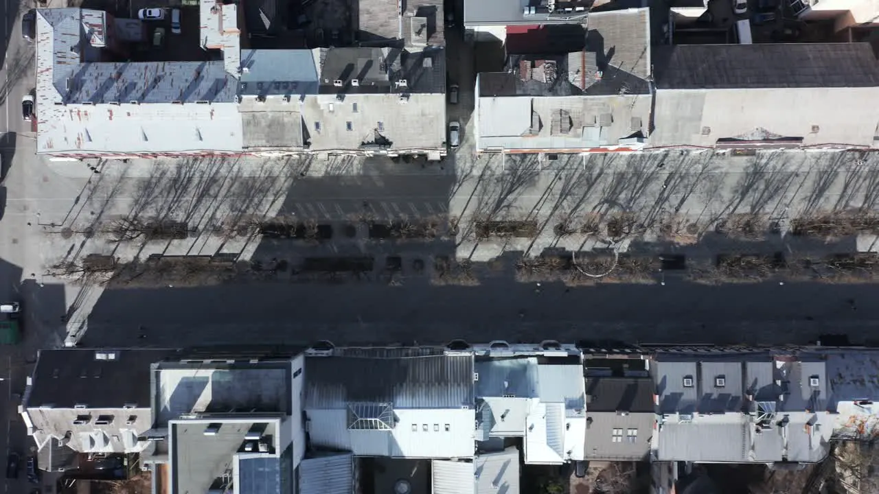 AERIAL Top View Shot of Laisves Avenue with Cars Driving and People Walking