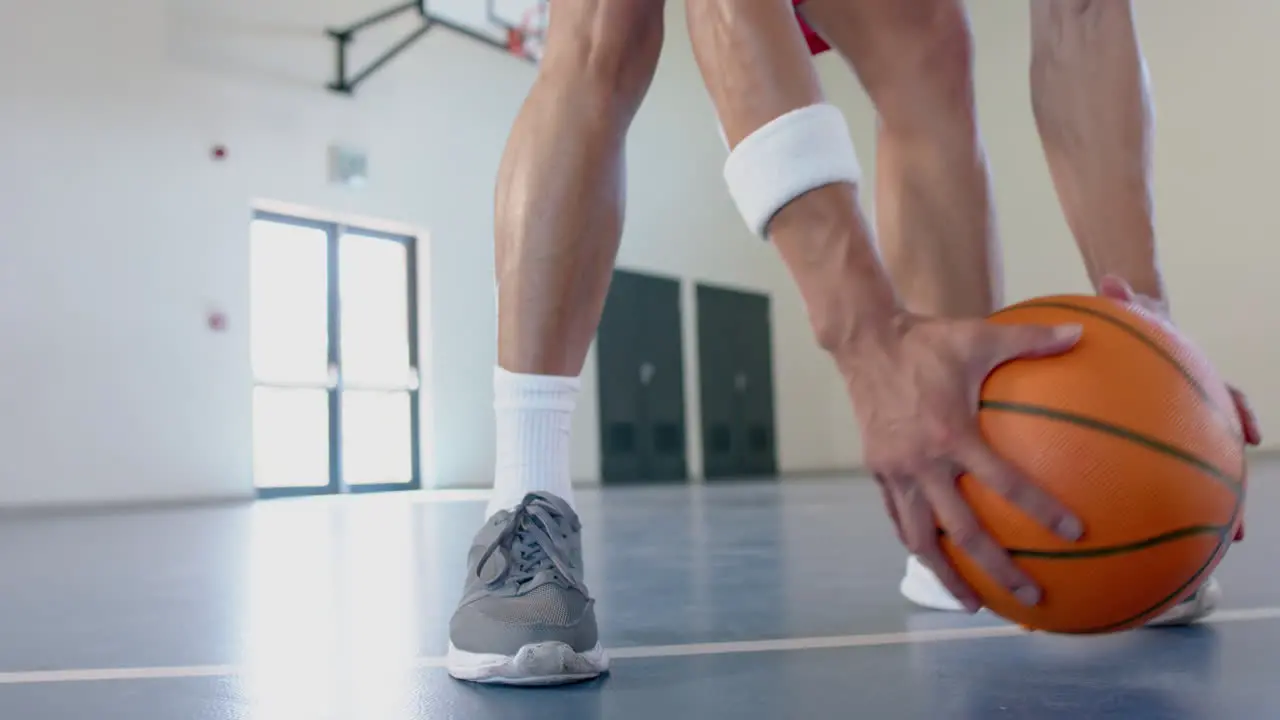 Athlete ready to play basketball in a gym