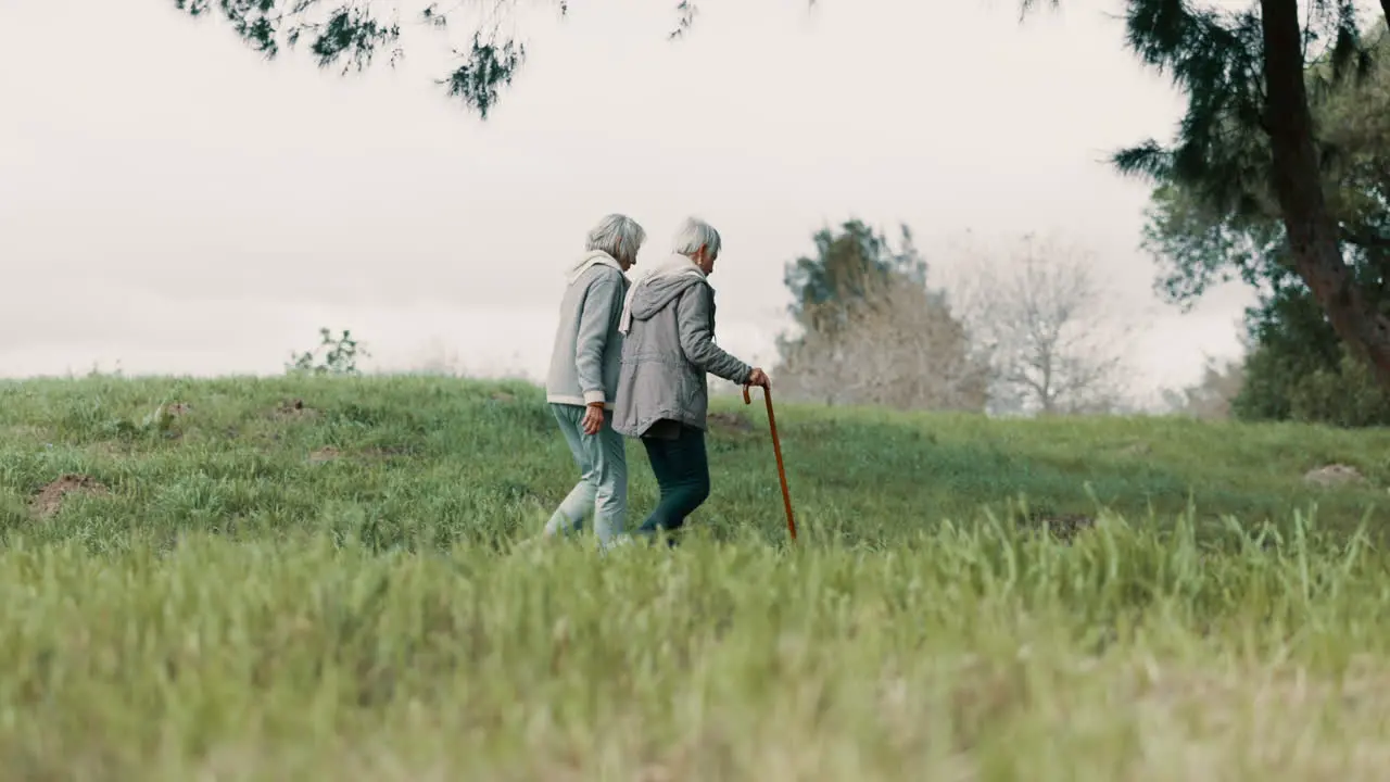 Park friends and senior woman with walking stick