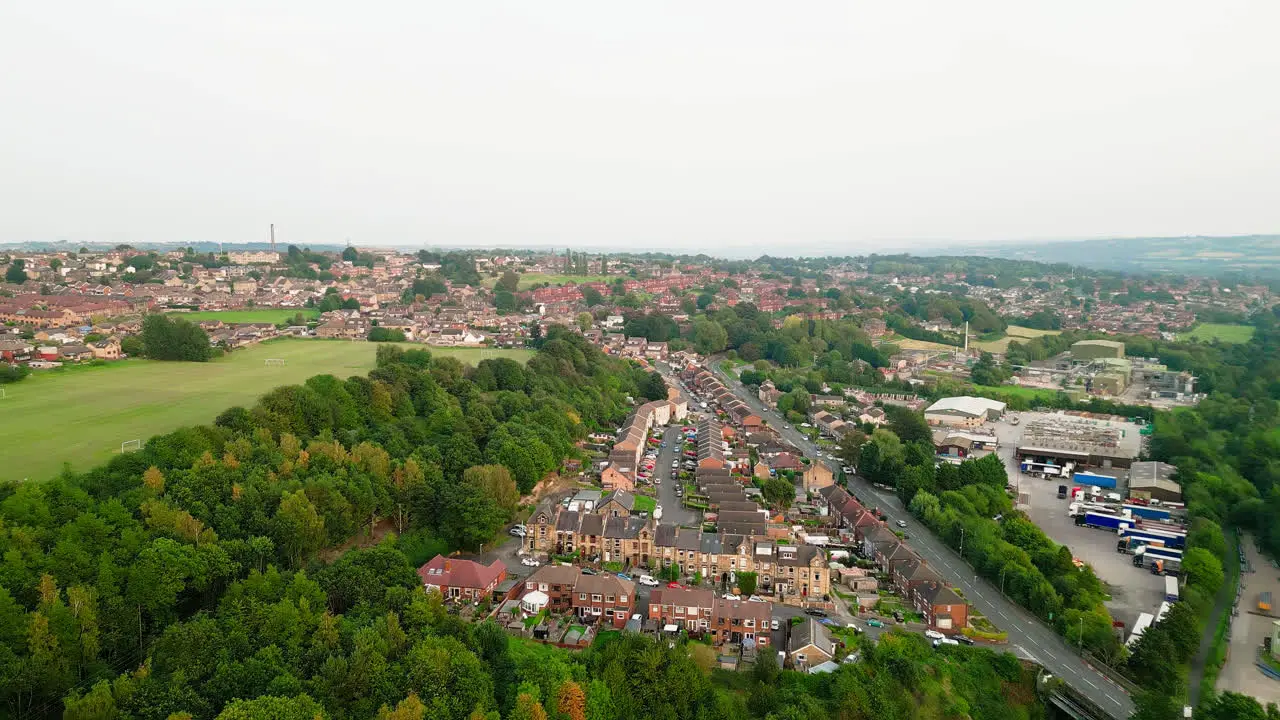 Dewsbury Moore Council estate's fame shines in this drone-captured video showcasing the classic urban housing red-brick terraced homes and the scenic Yorkshire landscape during a summer evening