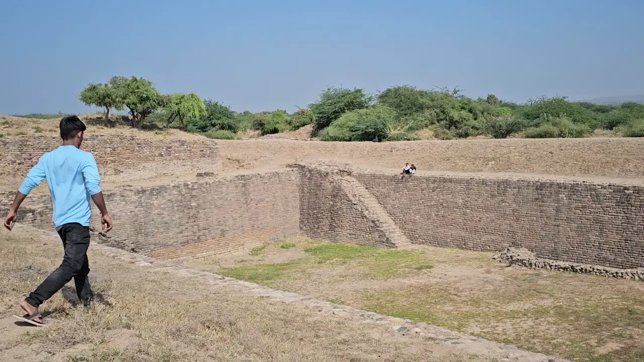 Dholavira Archeology Heritage Site a 5000 year old step well being viewed by people