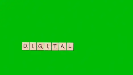 Stop Motion Business Concept Overhead Wooden Letter Tiles Forming Word Digital On Green Screen 1