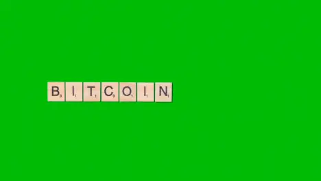 Stop Motion Business Concept Overhead Wooden Letter Tiles Forming Word Bitcoin On Green Screen 1