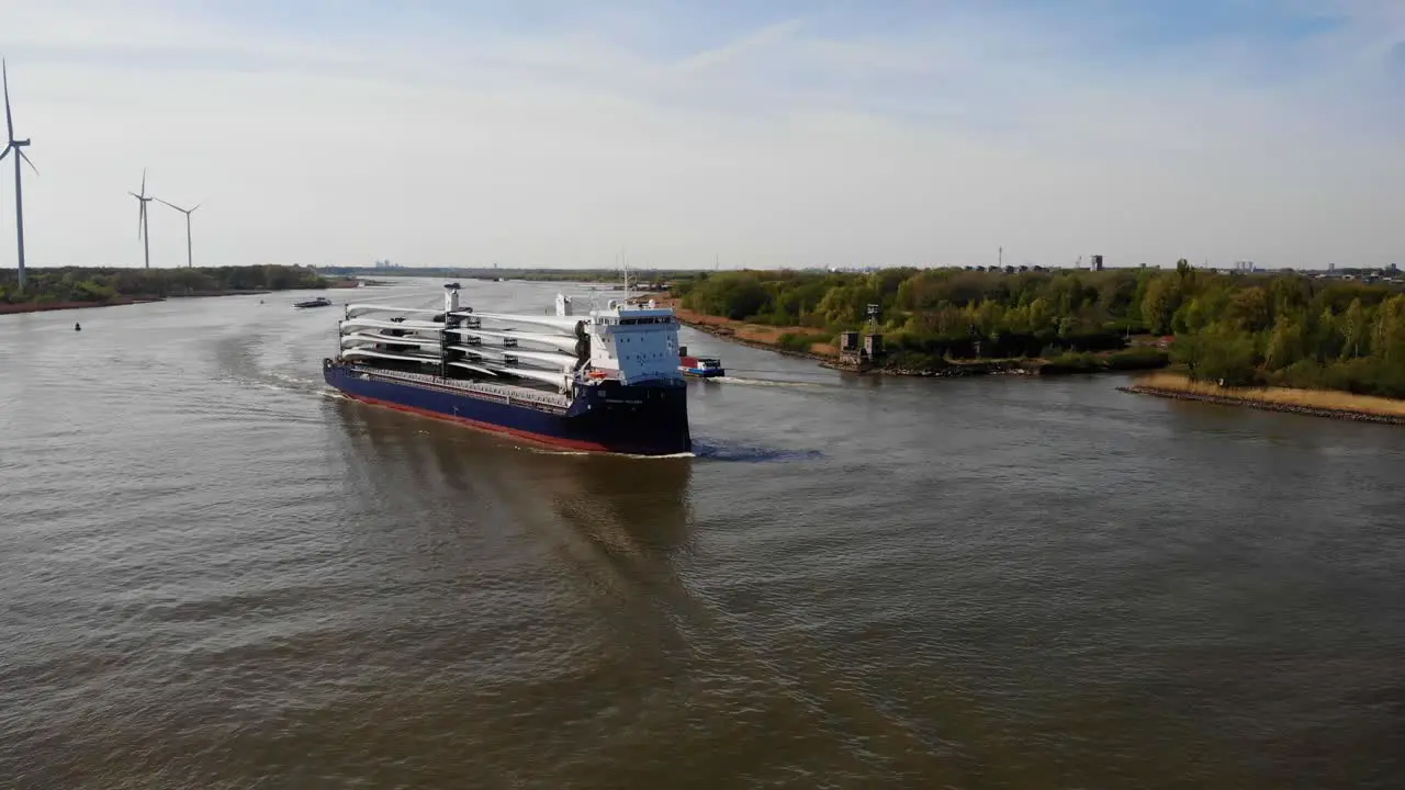 Aerial View Of Symphony Provider Cargo Ship Approaching River Bend On Oude Maas In Barendrecht Passing Another Ship