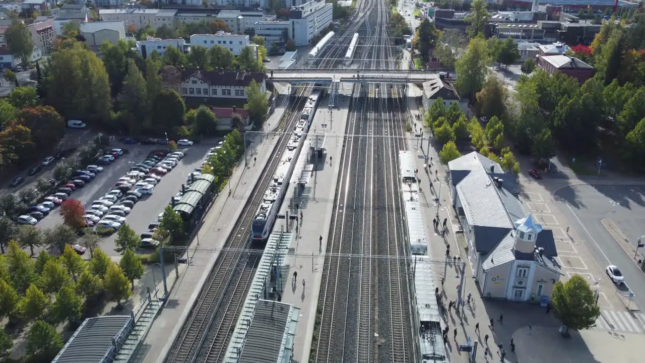 Passenger train departs Kerava Rail Station heading to Helsinki FIN